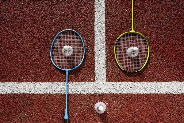 badminton-concept-with-racket-shuttlecock-min.jpg badminton-concept-with-racket-shuttlecock-min.jpg